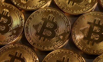 Volatile bitcoin falls from record low as crypto frenzy takes pause