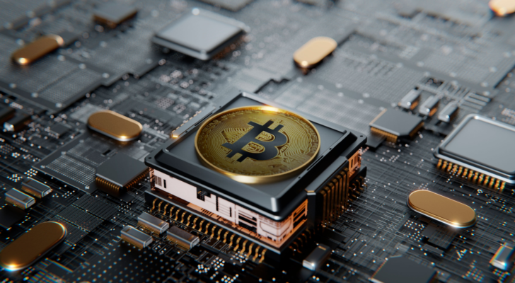 Bitcoin on a microprocessor in a motherboard.  With copy space and selective focus.  3D rendered banner illustration.  Concept for crypto currency, mining, technology, investment, finance, crypto mining stocks