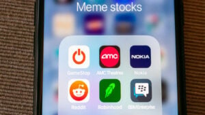 Meme stock icons on phone screen.  Meme stocks plummet