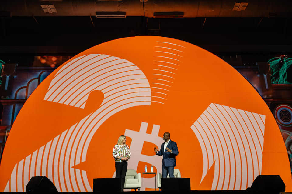 NASHVILLE, TENNESSEE - JULY 26: U.S. Senator Cynthia Lummis (R-WY) and U.S. Senator Tim Scott (R-SC) speak together onstage at Music City Center on July 26, 2024 in Nashville, Tennessee. The conference, which is aimed at bitcoin enthusiasts, features multiple retail and entertainment areas as well as seminars hosted by celebrities and politicians. (Photo by Jon Cherry/Getty Images)