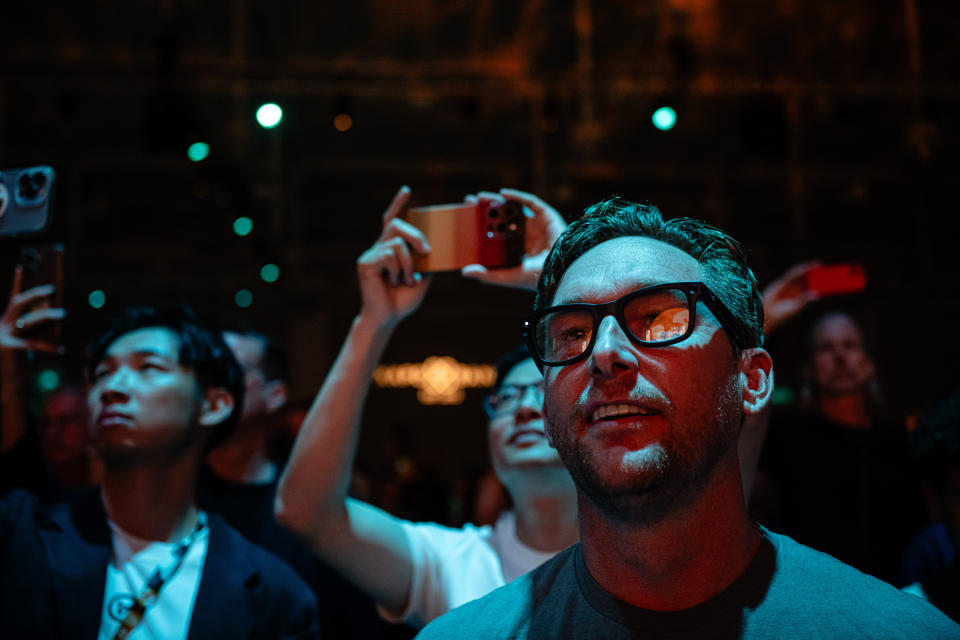 NASHVILLE, TENNESSEE - JULY 26: Attendees watch Independent Presidential Candidate Robert F. Kennedy Jr. deliver a speech during the Bitcoin 2024 Conference at Music City Center on July 26, 2024 in Nashville, Tennessee. The conference, which is aimed at bitcoin enthusiasts, features several retail and entertainment areas as well as seminars hosted by celebrities and politicians. (Photo by Jon Cherry/Getty Images)